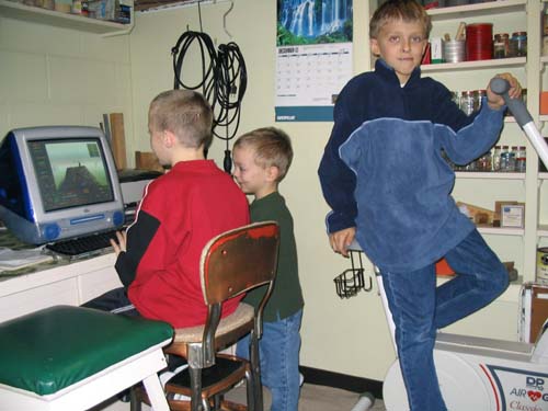 2003_12_22 136 Corte Daniel and Michael Plating Video Games