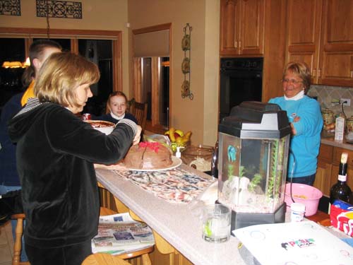 2004_01_31 029 Jeanie Supervisinfg the Cutting of the Cake