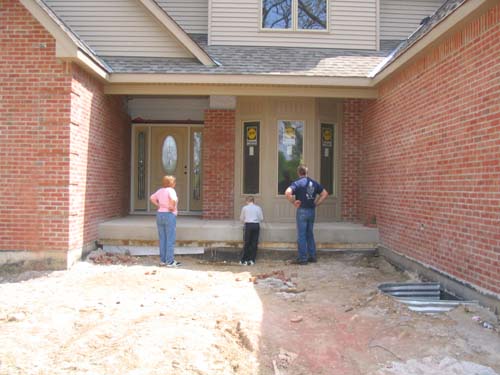 2004_05_08 024 Jeanie, Corte, and Terry Inspecting Front Porch