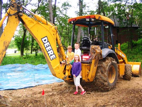 2004_06_27 027 Mason Corte And Allison on the Septic Tractor