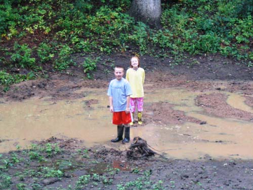 2004_09_07 144 Kid's play in the Unexpected Pond in the Back Yard